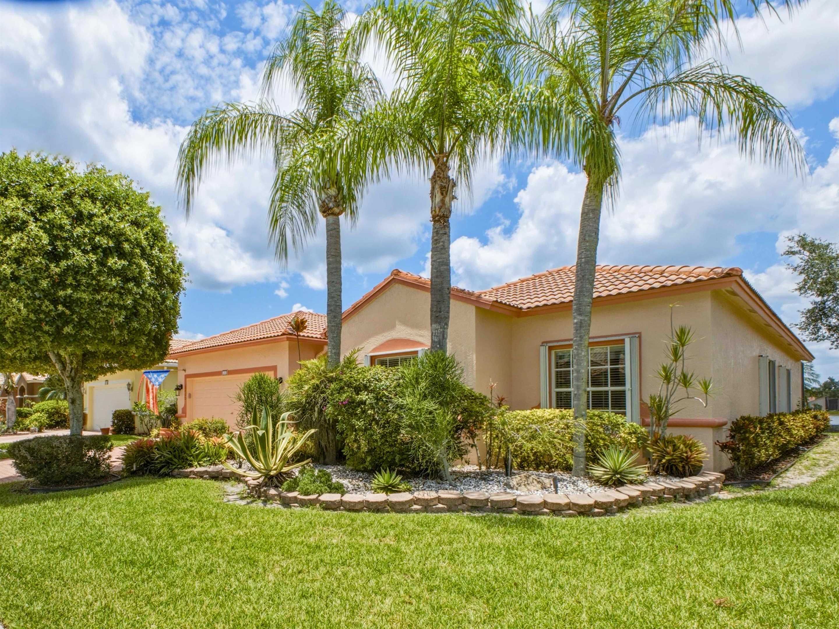 Additional front exterior view of the Boynton Beach home