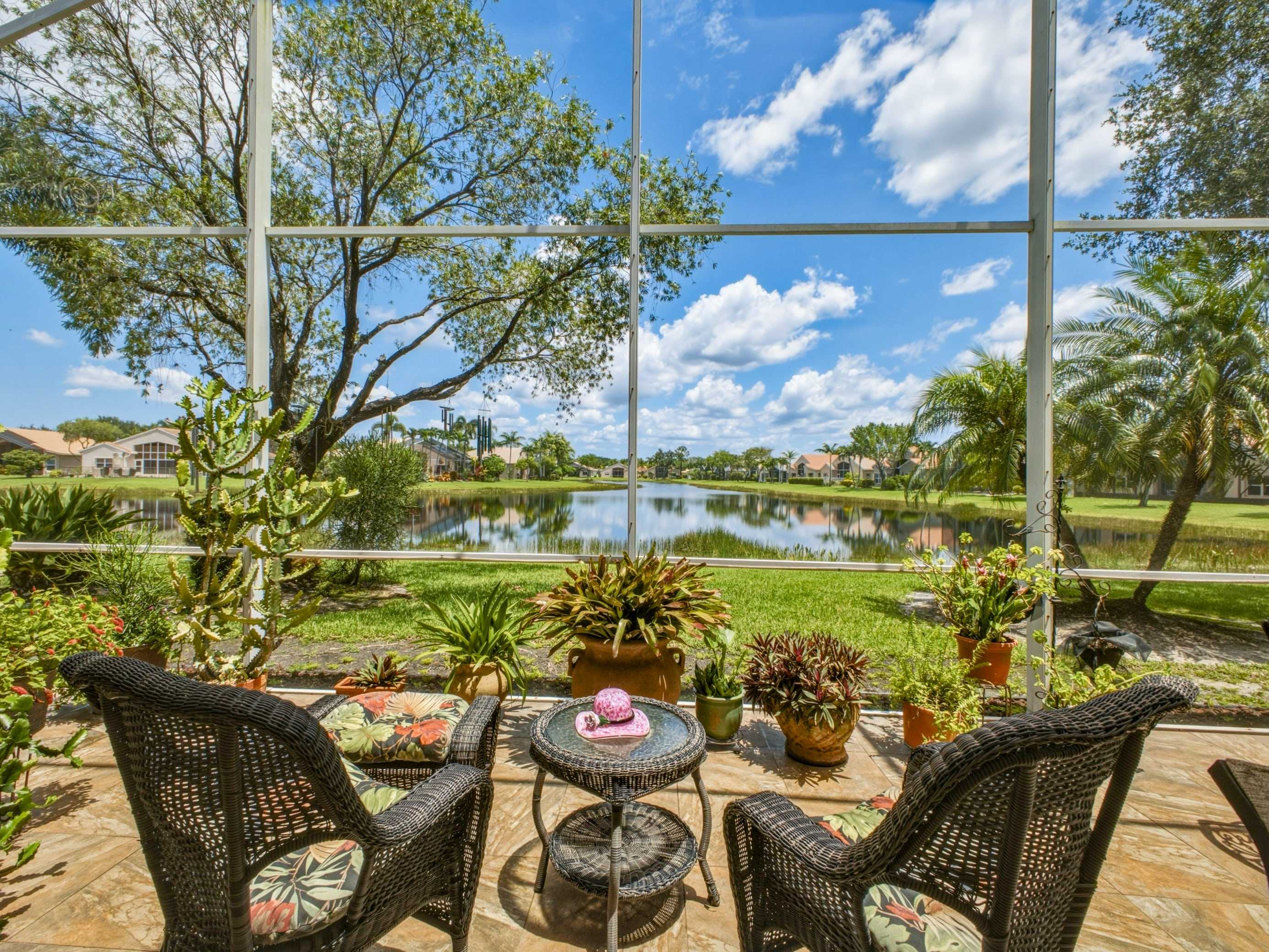 Open patio overlooking the lake at 8328 Grand Messina Circle